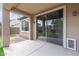 Covered patio with an outdoor area with both grass and desert landscaping at 1867 S Seton Ave, Gilbert, AZ 85295