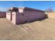 Exterior view of a home with a gravel backyard surrounded by a block fence at 1916 N 22Nd St, Phoenix, AZ 85006