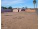 Large vacant lot ready to build with mature palm tree and privacy wall ready for a new home or development at 1916 N 22Nd St, Phoenix, AZ 85006