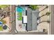 A bird's eye view of a beautiful home with a pool, lounging area, and manicured backyard, perfect for entertaining at 2045 N 68Th St, Scottsdale, AZ 85257