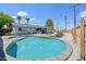 An inviting backyard featuring a refreshing pool, an outdoor kitchen, and ample space for lounging and recreation at 2045 N 68Th St, Scottsdale, AZ 85257