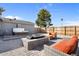 Serene backyard featuring an inviting hot tub, an outdoor firepit and comfortable seating at 2045 N 68Th St, Scottsdale, AZ 85257