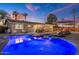 Beautiful backyard featuring a sparkling pool, covered patio with bar, and outdoor seating area at 2045 N 68Th St, Scottsdale, AZ 85257