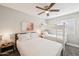 Bedroom with a queen sized bed and bunk beds, along with neutral paint and carpet at 2045 N 68Th St, Scottsdale, AZ 85257