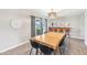 Stylish dining area with modern lighting, designer seating, and outdoor access at 2045 N 68Th St, Scottsdale, AZ 85257