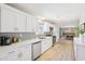 Bright kitchen featuring tile backsplash, modern appliances, and an open layout at 2045 N 68Th St, Scottsdale, AZ 85257