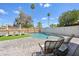 Relaxing pool area with lounge chairs, manicured landscaping, and a private fenced-in yard, perfect for outdoor enjoyment at 2045 N 68Th St, Scottsdale, AZ 85257