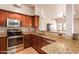 Updated kitchen features stainless steel appliances and granite countertops at 20660 N 40Th St # 2016, Phoenix, AZ 85050