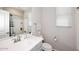 Clean bathroom with a single sink vanity and a combined shower and tub at 2425 E Beverly Rd, Phoenix, AZ 85042