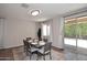 Bright dining room with sliding doors to the outside at 2425 E Beverly Rd, Phoenix, AZ 85042