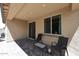 Cozy patio with brick pavers, sliding door access, and seating, perfect for outdoor entertaining at 2425 E Beverly Rd, Phoenix, AZ 85042