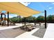 Shaded community playground with picnic tables and benches offers a great place for families to gather at 2425 E Beverly Rd, Phoenix, AZ 85042