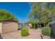 Backyard featuring a pool, patio, storage shed, and mature trees, offering a private outdoor retreat at 2534 N Mitchell St. St, Phoenix, AZ 85006