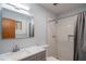 Clean bathroom featuring white subway tile, updated fixtures, and modern vanity at 2534 N Mitchell St. St, Phoenix, AZ 85006
