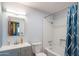 Clean bathroom featuring white subway tile, updated fixtures, and modern vanity at 2534 N Mitchell St. St, Phoenix, AZ 85006