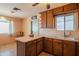 Bright kitchen featuring tile floors and an ample counter space with an eat-in breakfast bar at 2534 N Mitchell St. St, Phoenix, AZ 85006