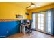 Bright home office featuring a unique color scheme, tile flooring, and bright natural light at 2534 N Mitchell St. St, Phoenix, AZ 85006