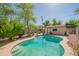 Backyard pool area with storage building, mature trees, and patio area, creating a private outdoor oasis at 2534 N Mitchell St. St, Phoenix, AZ 85006