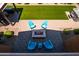 Aerial view of backyard oasis featuring fire pit, hot tub, BBQ and lounge at 30876 N 128Th Dr, Peoria, AZ 85383