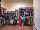 Spacious walk-in closet with ample storage and shelving, great for organization at 30876 N 128Th Dr, Peoria, AZ 85383