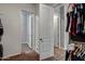 Hallway with open doors at 30876 N 128Th Dr, Peoria, AZ 85383
