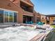 Luxurious hot tub with views of the outdoor fire pit and grilling station at 30876 N 128Th Dr, Peoria, AZ 85383