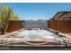 Inviting outdoor hot tub with beautiful stone design and clear blue skies above at 30876 N 128Th Dr, Peoria, AZ 85383