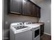 Laundry room featuring modern washer and dryer at 30876 N 128Th Dr, Peoria, AZ 85383