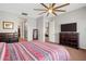 Generously sized primary bedroom with en-suite bathroom and walk-in closet at 30876 N 128Th Dr, Peoria, AZ 85383