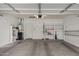 Clean two-car garage with water heater, shelves, and storage at 3793 E Lexington Ave, Gilbert, AZ 85234