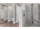 Newly remodeled walk-in shower in main bathroom with gray tiling and brushed nickel fixtures at 3793 E Lexington Ave, Gilbert, AZ 85234
