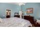 Serene main bedroom boasts ensuite bath, walk-in closet, and abundant natural light at 3793 E Lexington Ave, Gilbert, AZ 85234