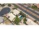 Stunning aerial view of a home with a private pool and lush landscaping at 3854 E Cathedral Rock Dr, Phoenix, AZ 85044