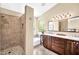 Bright bathroom features a walk-in shower, a soaking tub, and a double vanity at 3854 E Cathedral Rock Dr, Phoenix, AZ 85044