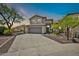 Charming two-story home with a well-manicured lawn and a spacious driveway at 3854 E Cathedral Rock Dr, Phoenix, AZ 85044