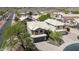 Two-story home featuring a well-maintained lawn and convenient two-car garage at 3854 E Cathedral Rock Dr, Phoenix, AZ 85044