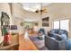 Spacious open-concept living area featuring terracotta tile flooring and vaulted ceilings at 3854 E Cathedral Rock Dr, Phoenix, AZ 85044