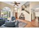 Inviting living room with vaulted ceilings, neutral tones and terracotta tile flooring at 3854 E Cathedral Rock Dr, Phoenix, AZ 85044