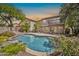 The backyard boasts a private pool, patio, and a beautiful view of the house at 3854 E Cathedral Rock Dr, Phoenix, AZ 85044