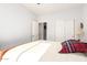 Bright bedroom offering closet space and a door to the ensuite bath at 40853 W Bravo Dr, Maricopa, AZ 85138