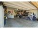Spacious garage with ample storage and room for two vehicles at 40853 W Bravo Dr, Maricopa, AZ 85138