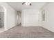 A carpeted bedroom with an ensuite bathroom and closet provide a clean and inviting space at 4368 E Cullumber St, Gilbert, AZ 85234