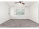 Bright bedroom with large windows offers natural light and neutral-toned carpet at 4368 E Cullumber St, Gilbert, AZ 85234