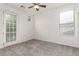 Airy bedroom with natural light from large windows and a glass patio door at 4368 E Cullumber St, Gilbert, AZ 85234