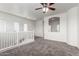Spacious loft area with a view of the staircase, a ceiling fan and lots of windows at 4368 E Cullumber St, Gilbert, AZ 85234