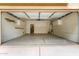 Spacious two-car garage with ample storage cabinets and epoxy flooring at 4368 E Cullumber St, Gilbert, AZ 85234
