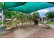 Community playground features a shade canopy and fun play equipment for residents at 4368 E Cullumber St, Gilbert, AZ 85234