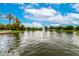 Scenic pond with a fountain and lush greenery provides a serene community view at 4368 E Cullumber St, Gilbert, AZ 85234