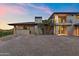 Modern home with an inviting paver driveway, desert landscaping, and a stylish architectural design at 4536 E Foothill Dr, Paradise Valley, AZ 85253