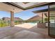 Expansive outdoor patio offering views of the pool and desert landscape at 4536 E Foothill Dr, Paradise Valley, AZ 85253